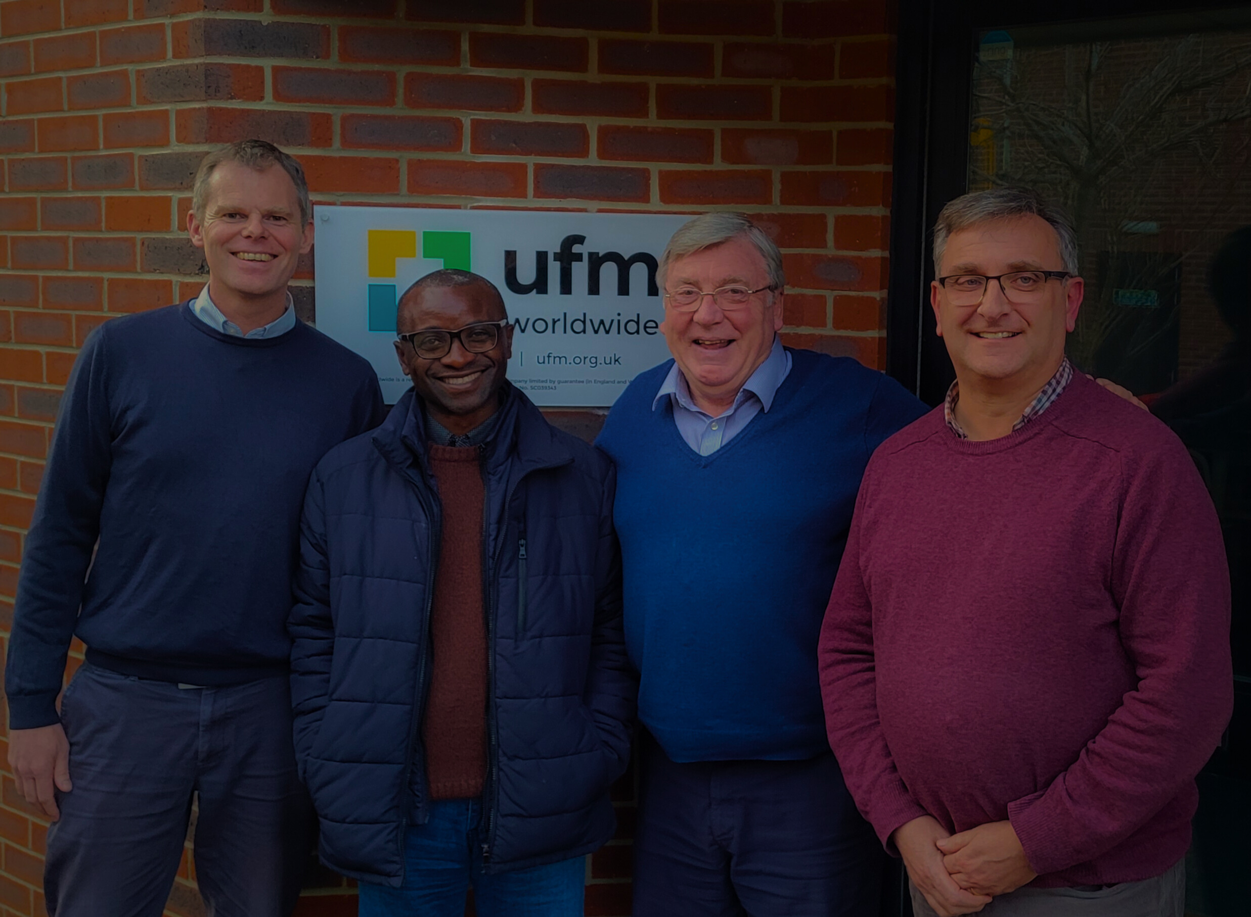 People holding Prayerlines booklet
